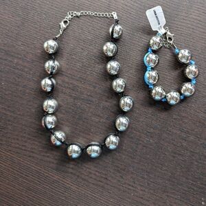 Silver tone black corded choker and NWT blue corded bracelet set 25$for the set